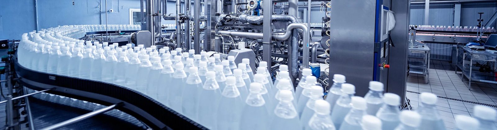 Automated PET juice bottle filling line with conveyor, labelling and capping - turnkey juice bottling project